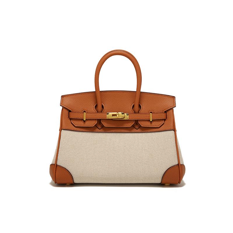 Весна 2025 г. Женская сумка через плечо из кожи и холста контрастного цвета