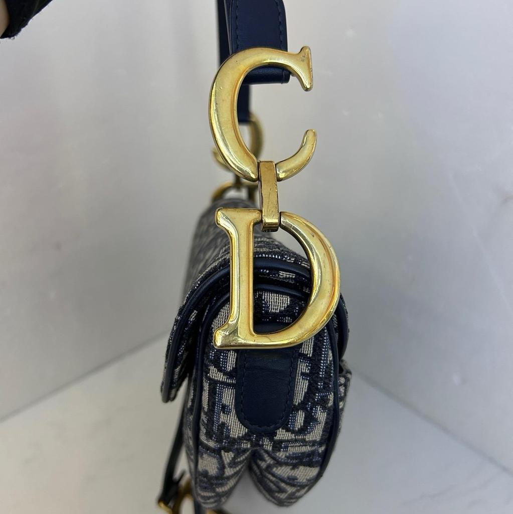 [Pre-Owned] Saddle Removable Adjustable Shoulder Strap Magnetic Buckle Closure Printed Saddle Bag Crossbody Bag Fabric Handbag Sho - Very Good #J7OH9S