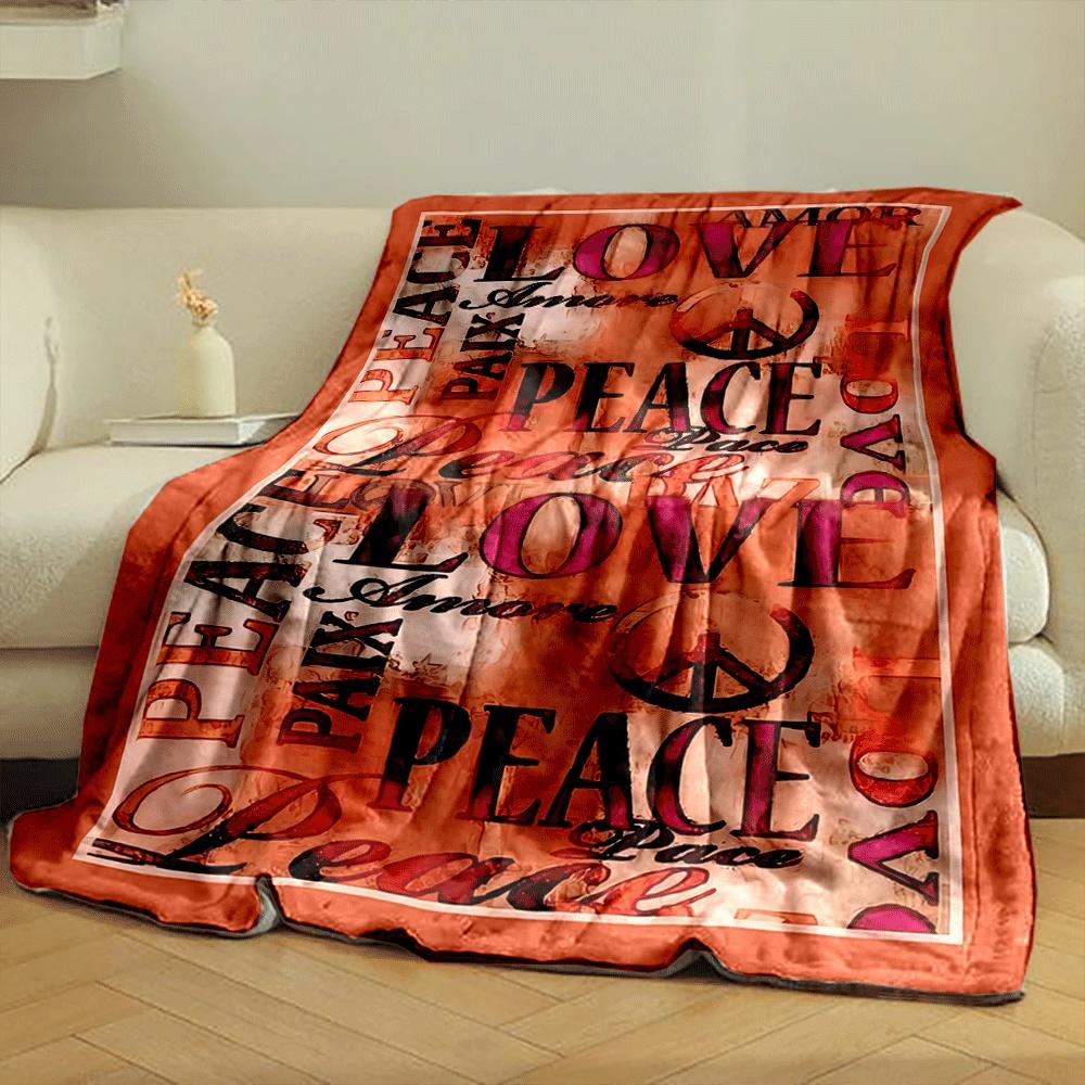 The pattern features "Love" and "Peace" text in various styles and colors. for all seasons blanket lunch break throw gift