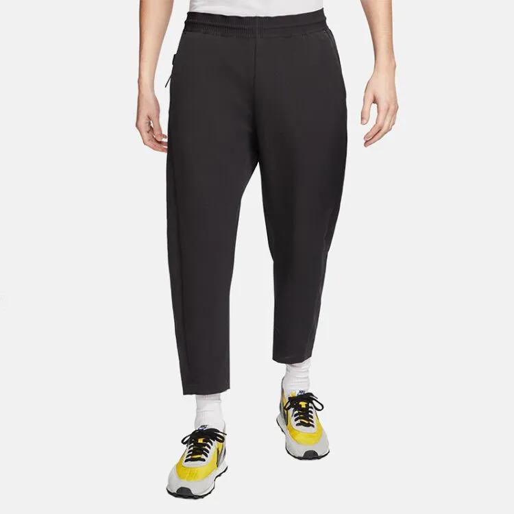 Nike Мужские трикотажные штаны-шаровары черные средние (унисекс) Трикотажные спортивные штаны AR1563 010