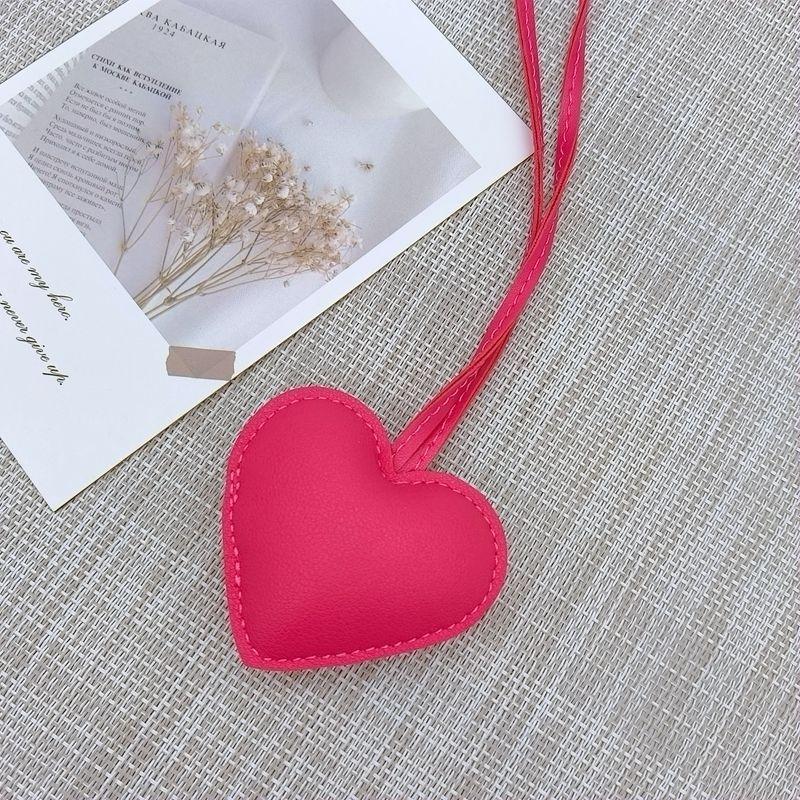 New niche leather peach hand rope pendant simple bag pendant car couple backpack accessories fashion Bag Charm
