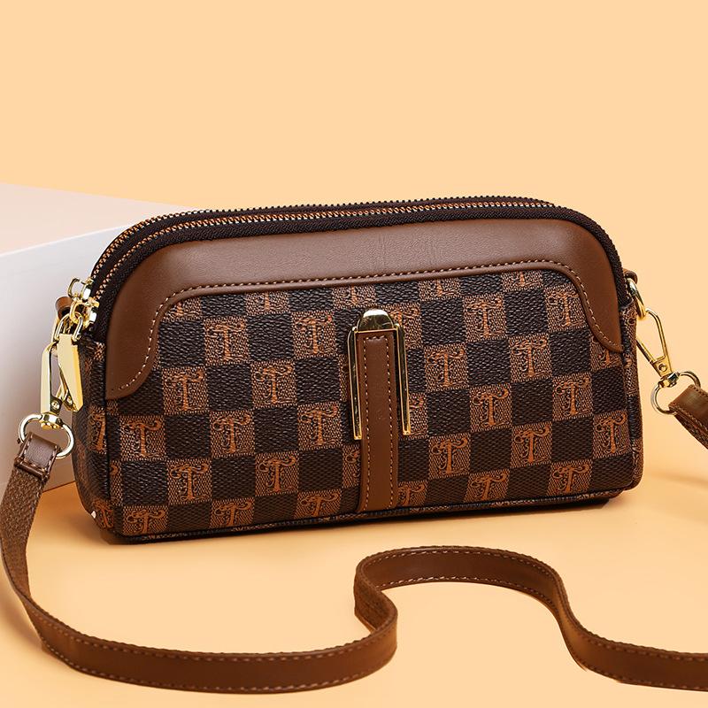 Soft leather shoulder messenger bag casual women's bag contrasting colors fashionable travel spring and summer new women's mobile phone bag