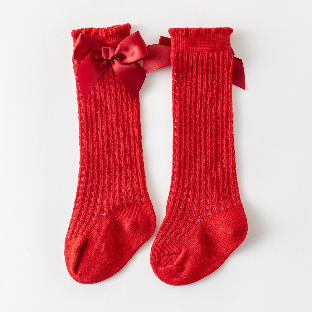 Летние носки для маленьких девочек, милые большие банты, мягкие хлопковые эластичные однотонные сетчатые носки для новорожденных, длинные носки до колена для маленьких девочек