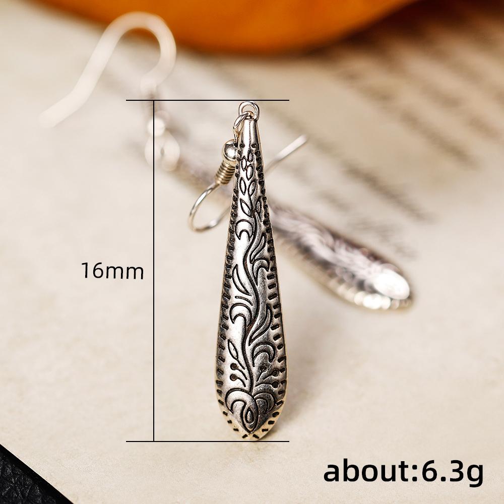 Новые длинные висячие серьги в форме капли воды с резным узором для женщин, металлические антисеребряные винтажные серьги, ювелирные изделия