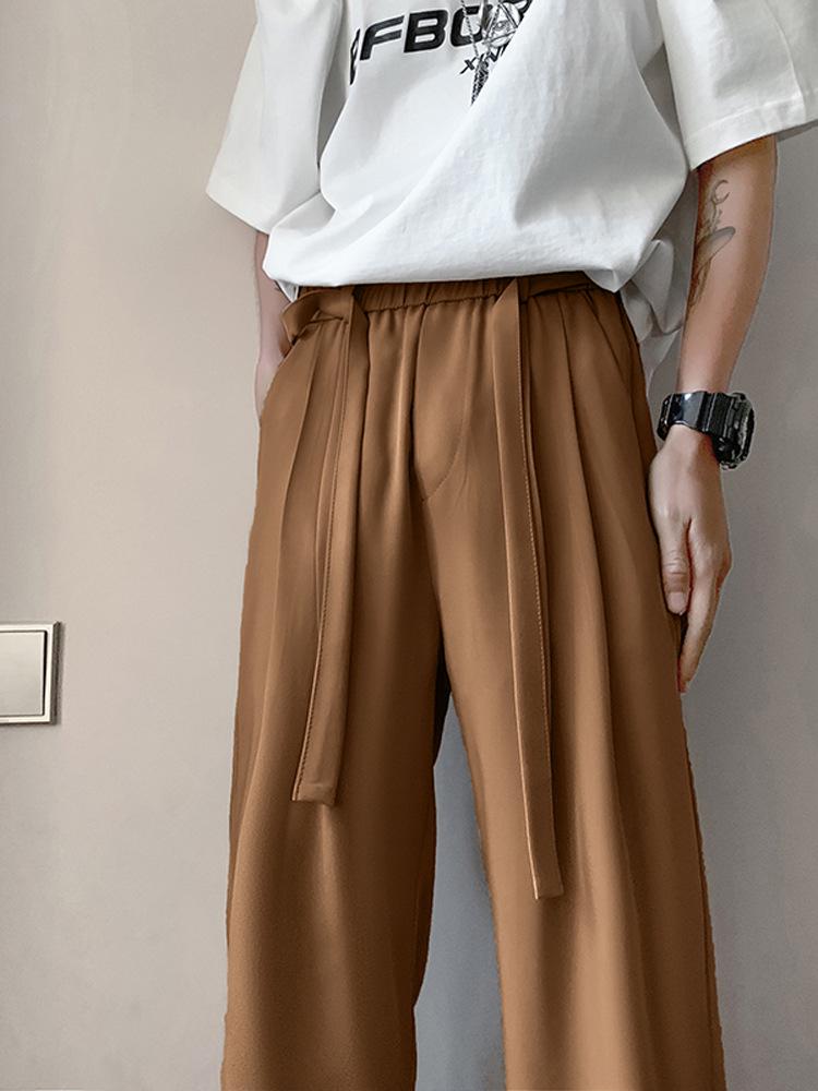 Брюки из итальянского драпированного ледяного шелка в стиле британских яппи с завязками