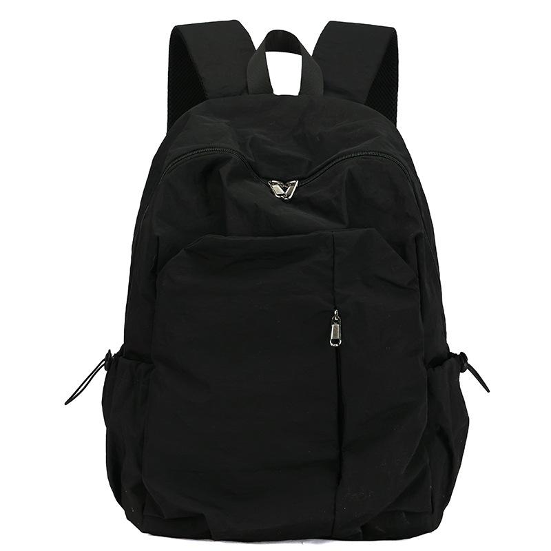 Schoolbag1011 New large-capacity backpack, male and female students schoolbag, multi-functional travel bag, casual and simple commuter bag