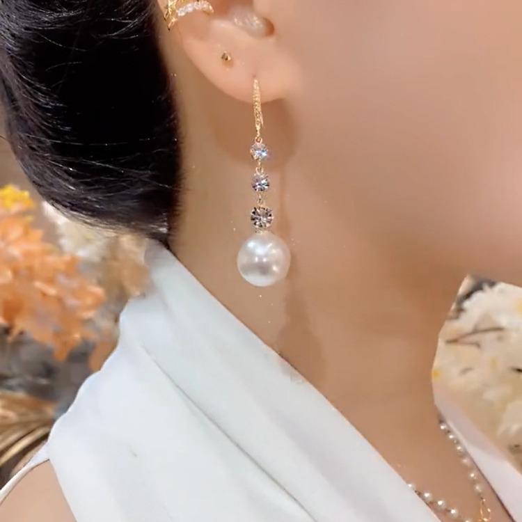 Элегантные серьги-подвески с жемчугом: Универсальный и Стройнящий для Женщин - Тренд 2025.
