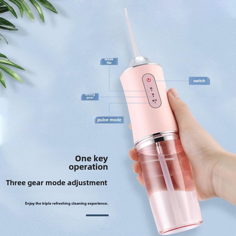 Портативный электрический ирригатор: Очиститель зубов и спрей для ухода за полостью рта.