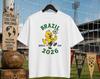 Чемпионат мира 2026 Бразилия Злая Канарейка Футболка, Ретро Футболка с Маскотом, Футболка для Болельщика Футбола Бразилии, Винтажная Спортивная Графическая Унисекс Футболка