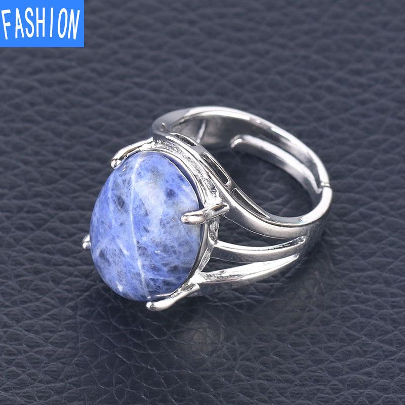 Oval Natural Crystal Four-claw Inlaid Hollow Ring