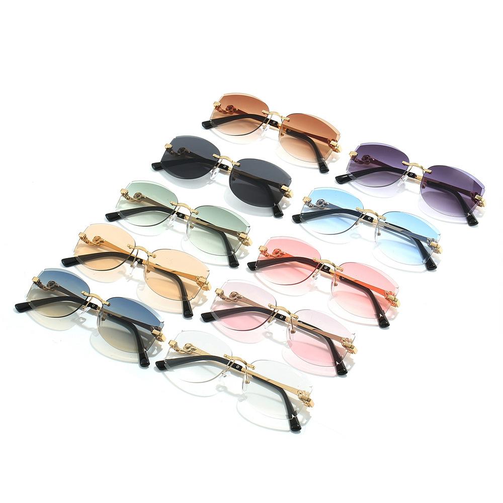 New large-frame sunglasses frameless thin sunglasses women's metal fox head UV protection driving trimmed glasses tide