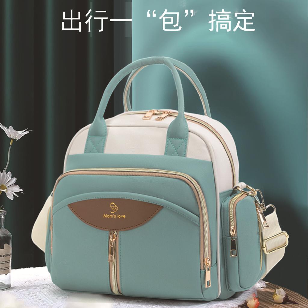 New mommy bag, multi-functional, large capacity, lightweight, with separate compartments for wet and dry items, can be carried as a backpack or