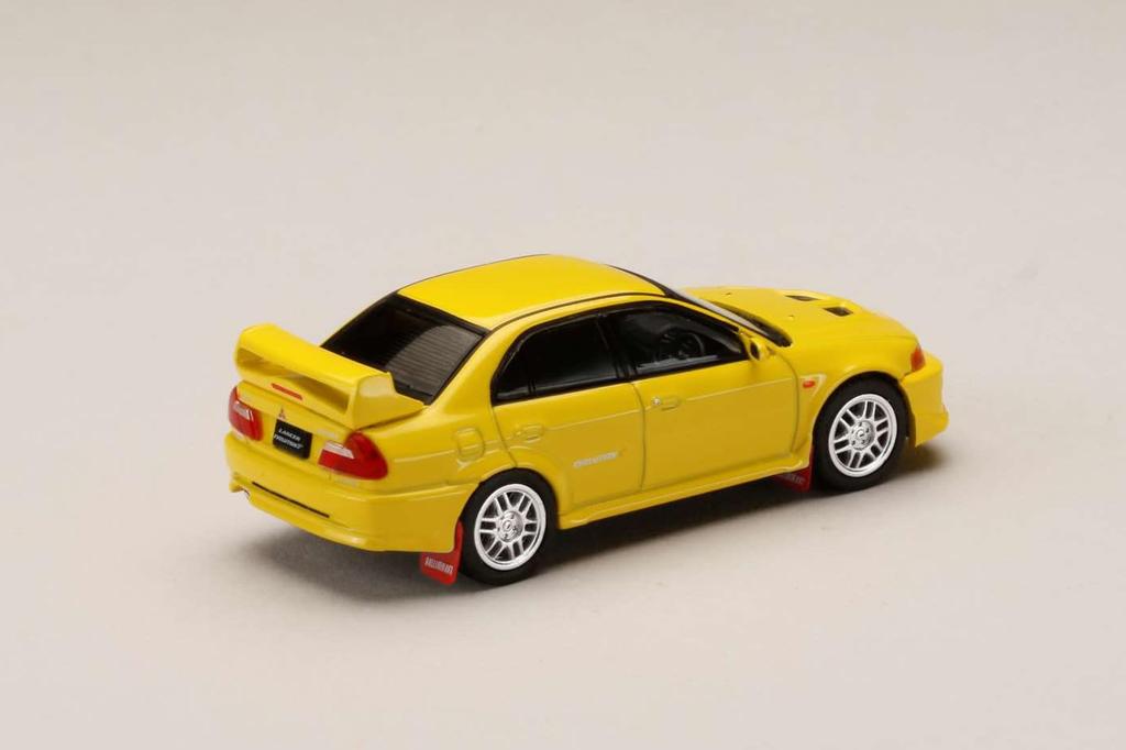 Mitsubishi Lancer GSR Evolution 5 1998 с брызговиком Dandelion Yellow 1/64 (CP9A)