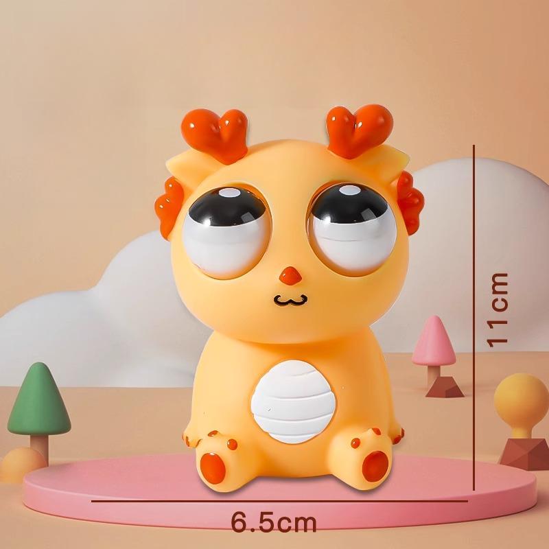 Разожмите игрушку для разминания «Взрывной глаз дракона» Сожмите куклу-дракона, чтобы выпустить игрушку «Взрывной глаз дракона»