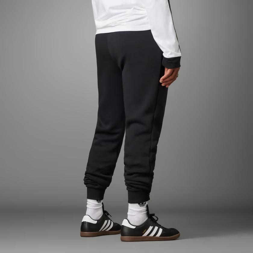 Adidas Мужские трикотажные брюки-джоггеры Manchester United Essentials FW23, черные IK8709