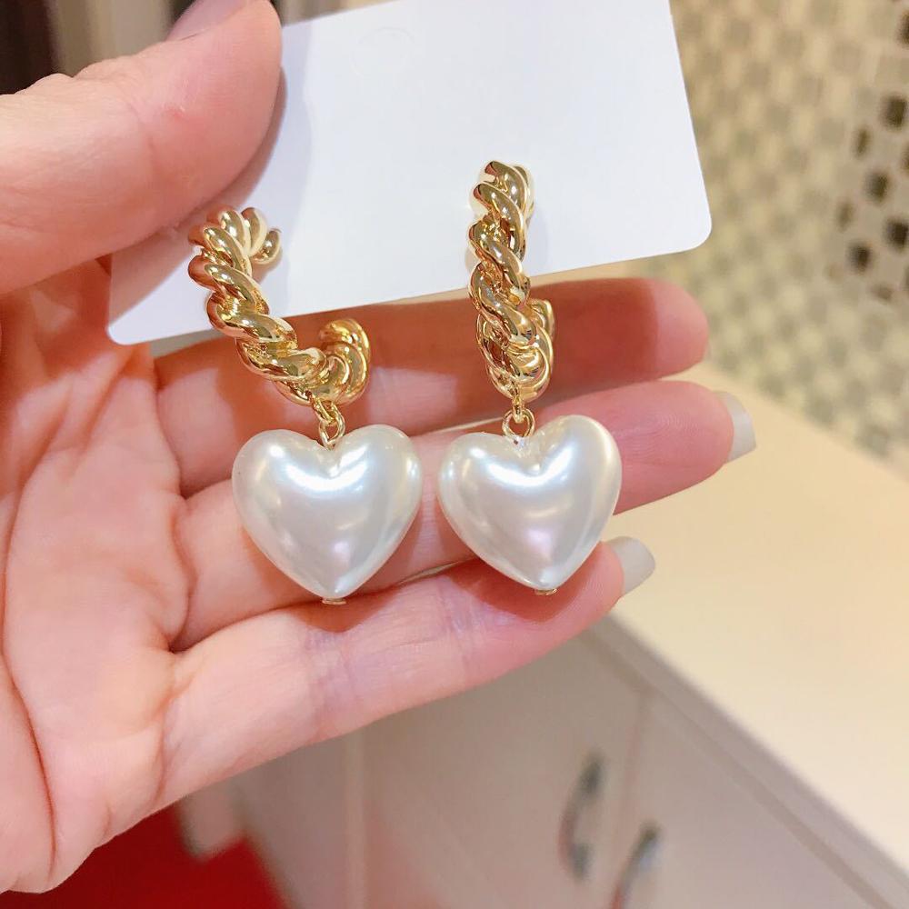 Темперамент Новые ретро девушки геометрические жемчужные серьги скрученные круглые сращивающиеся пеньковые серьги-кольца