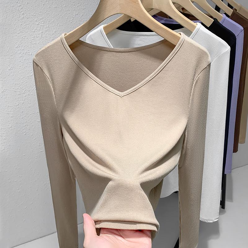 Рубашка с резьбой по низу женская 2025 новая европейская женская одежда темпераментный V-образный вырез футболка с длинным рукавом эластичный внутренний пояс топ