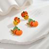 Whimsical Long Pumpkin Earrings For Halloween Featuring Cute Cartoon Characters In Alloy