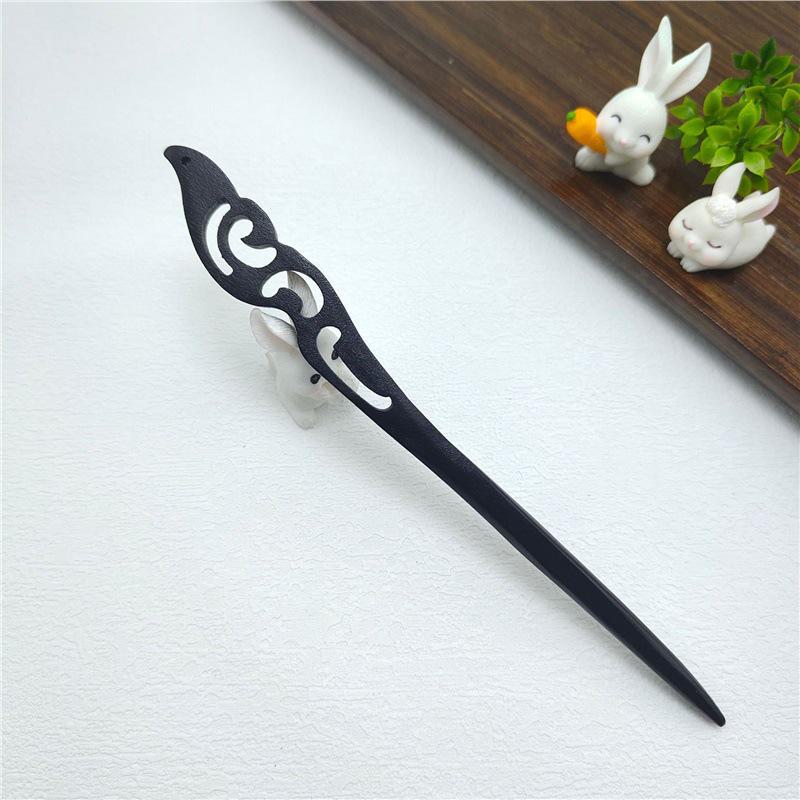 Элегантная шпилька из черного дерева: Современная простота в сочетании с древним китайским стилем