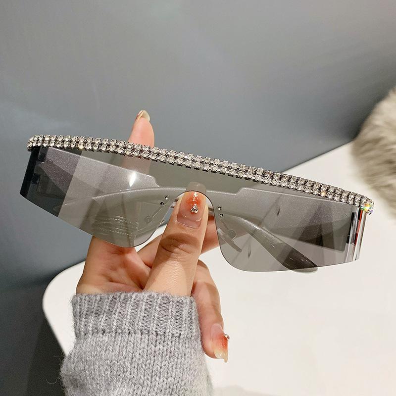 Frameless point drill one-piece sunglasses, men's and women's European and American personality large box versatile glasses, street shooting personali