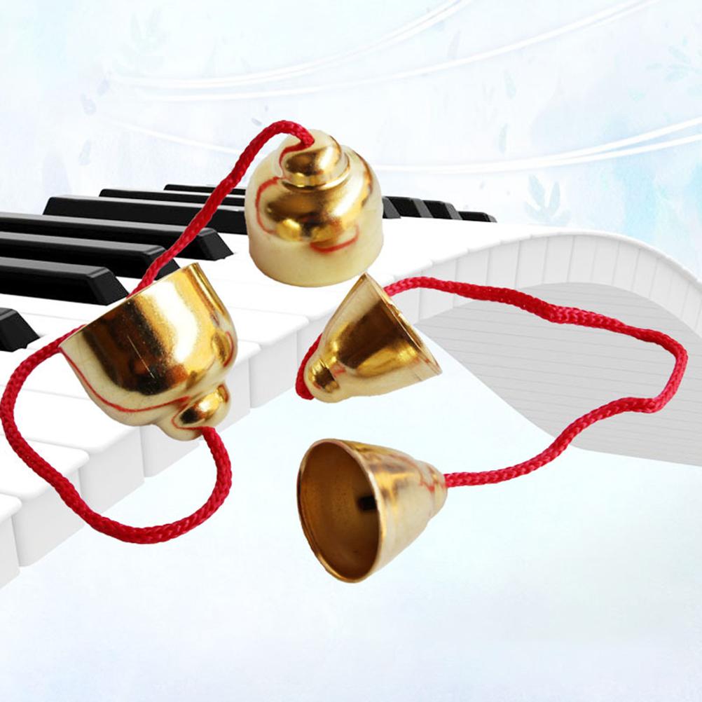 1 пара золотых сплавных колокольчиков, ударных колокольчиков, музыкальных инструментов, ритмических игрушек, ручных колокольчиков