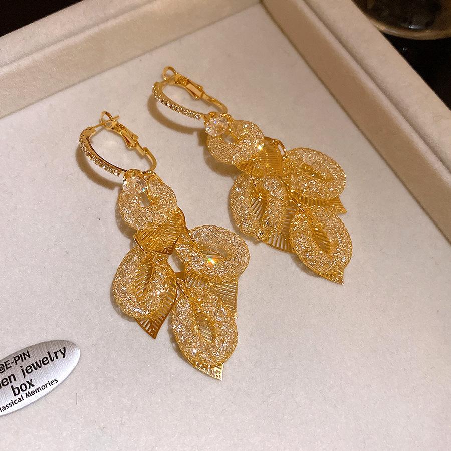 Silver needle zircon leaf fringed earrings light luxury high-end earrings European and American fashion versatile earrings design sense niche