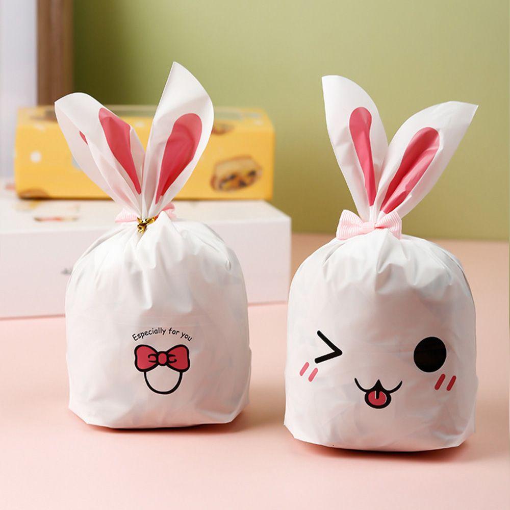 50 шт. Новые пасхальные картонные мешочки с ушками кролика, пластиковые мешочки для конфет в виде животных для детей, упаковка для печенья на день рождения, подарки своими руками