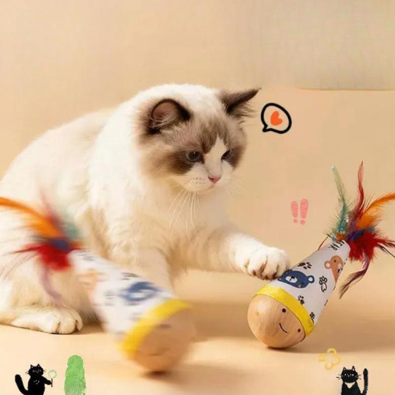 Портативная игрушка-неваляшка с перьями для кошек: Саморазвлечение и расход энергии для кошек