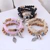 4Pcs/Set Bohemian Women Cowrie Shell Leaf Charm Candy Beaded Elastic Bracelet