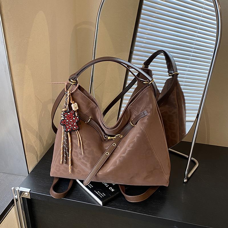 Вместительная сумка-ведро для поездок на работу, женская, нишевый дизайн 2025, новая сумка через плечо, многофункциональный рюкзак в корейском стиле