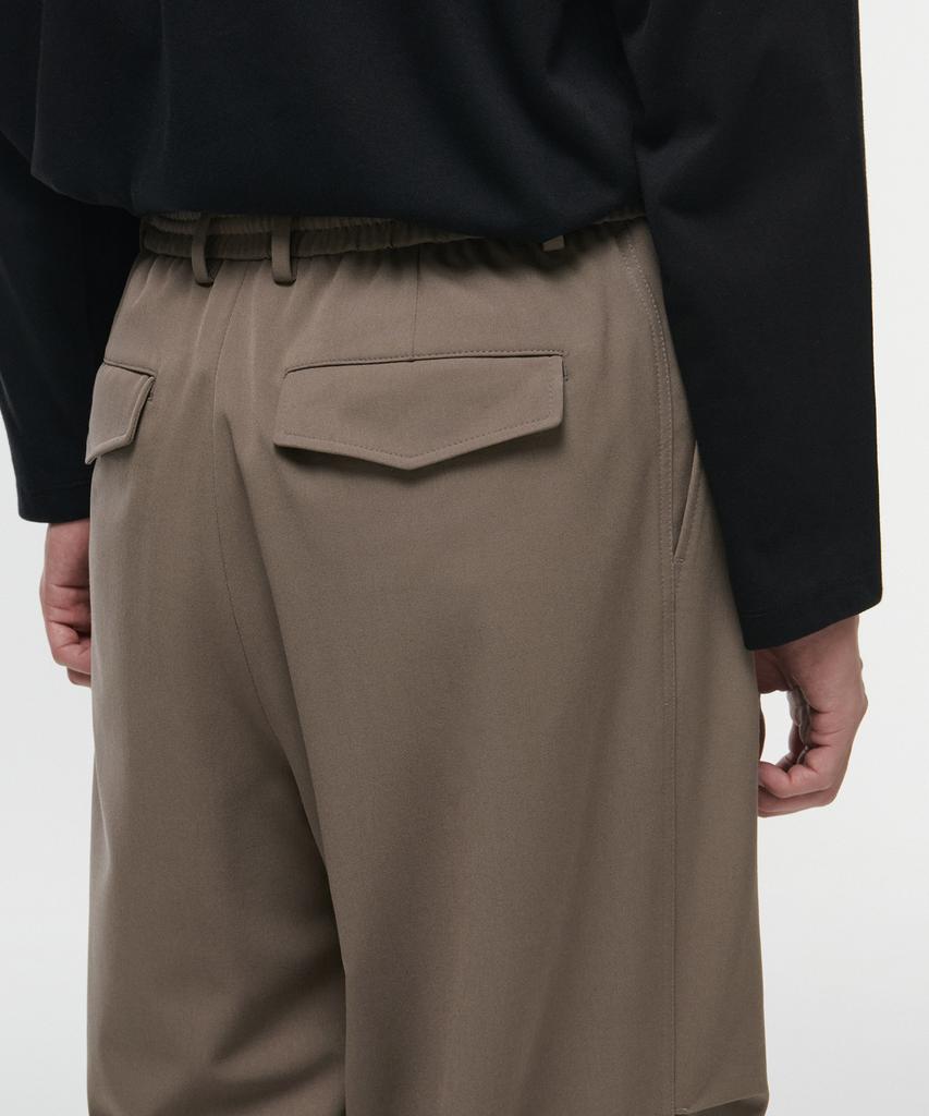 MUSINSA STANDARD Parachute Banding Slacks [Dusty Beige]