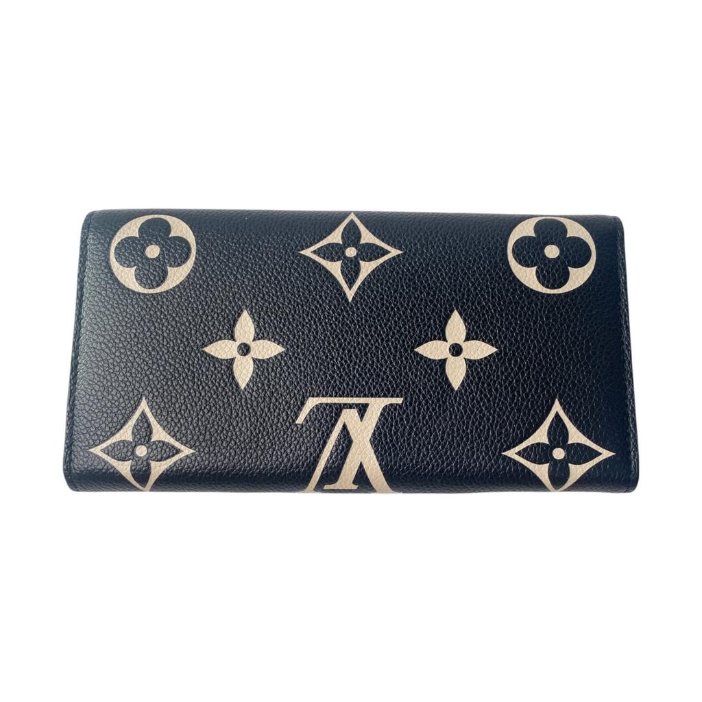 Подержанный кошелек LOUIS VUITTON Серия Black/Кремовый тип кожа Женский