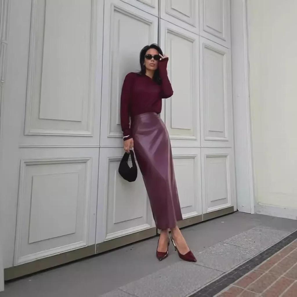 Осень 2024 года. Сексуальная кожаная юбка с высокой талией и разрезом.