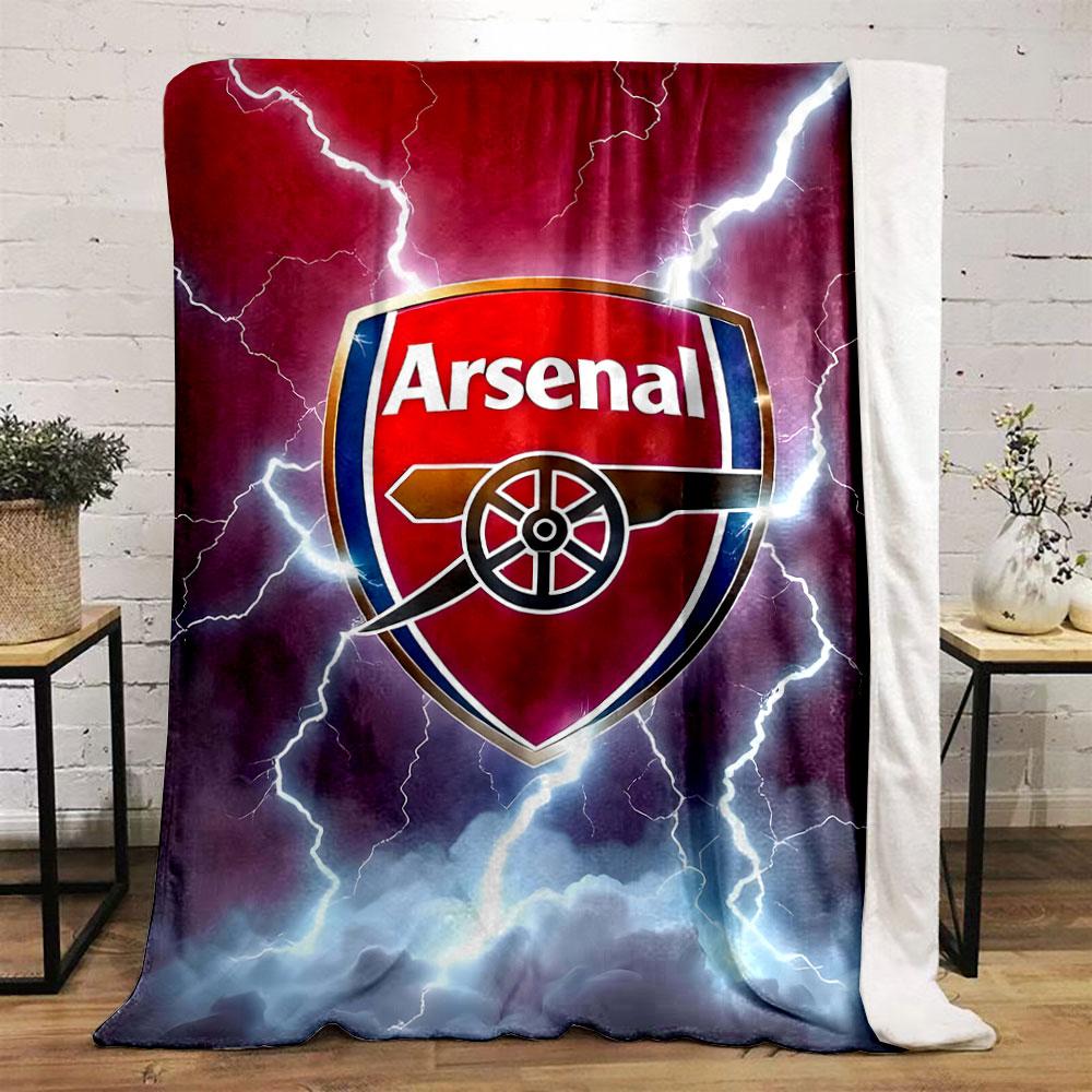 Red shield emblem with a cannon, surrounded by lightning and storm clouds. for all seasons blanket lunch break throw gift