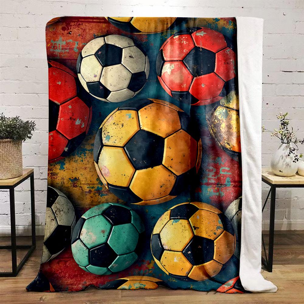 Multiple colorful soccer balls with worn textures on a vibrant background. for all seasons blanket lunch break throw gift