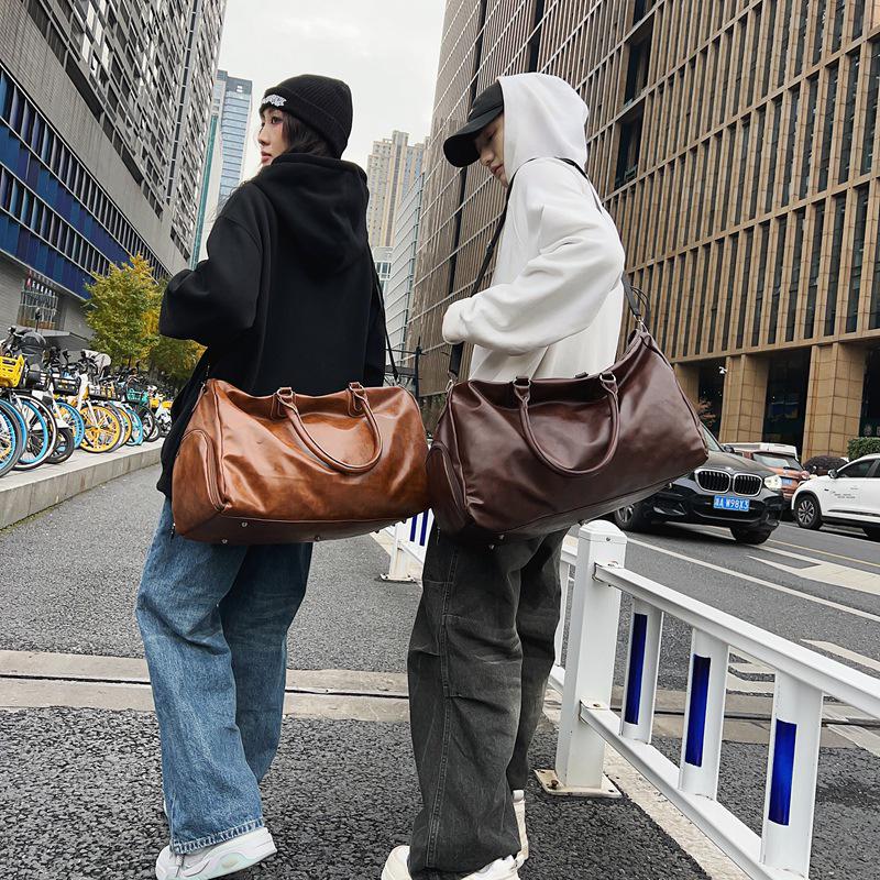 Ruiying Ретро Водонепроницаемая Унисекс Дорожная Сумка из ПУ Кожи - Большая Вместимость для Спортзала и Ручная Кладь для Самолета