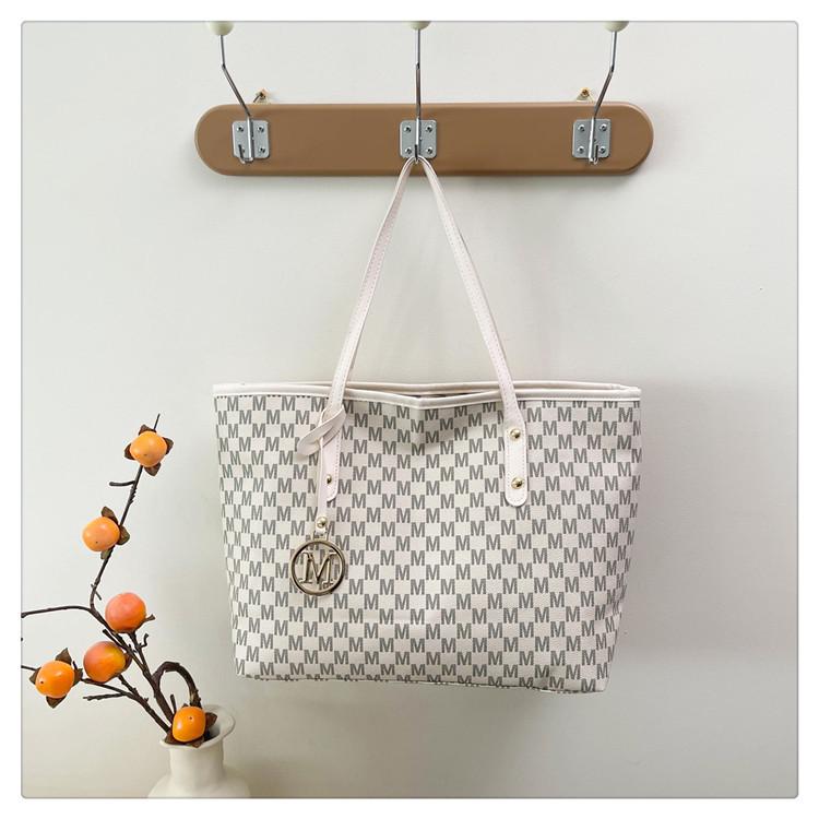 Женская модная сумка-тоут для通勤 2025 года большой вместимости высокого класса с дизайном в виде букв.