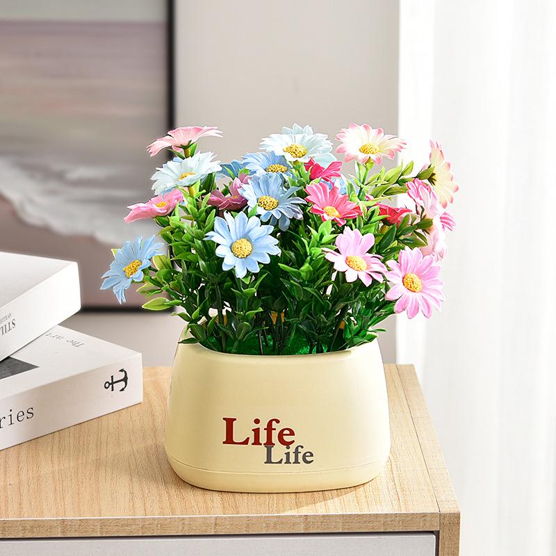 Living Room Decor: Artificial Sunflower and Green Plant Arrangements, Small Potted Plants, and Plastic Bouquets