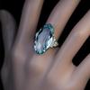 Fashionable Oval Blue Zircon Ring with Large Grain Design in Alloy