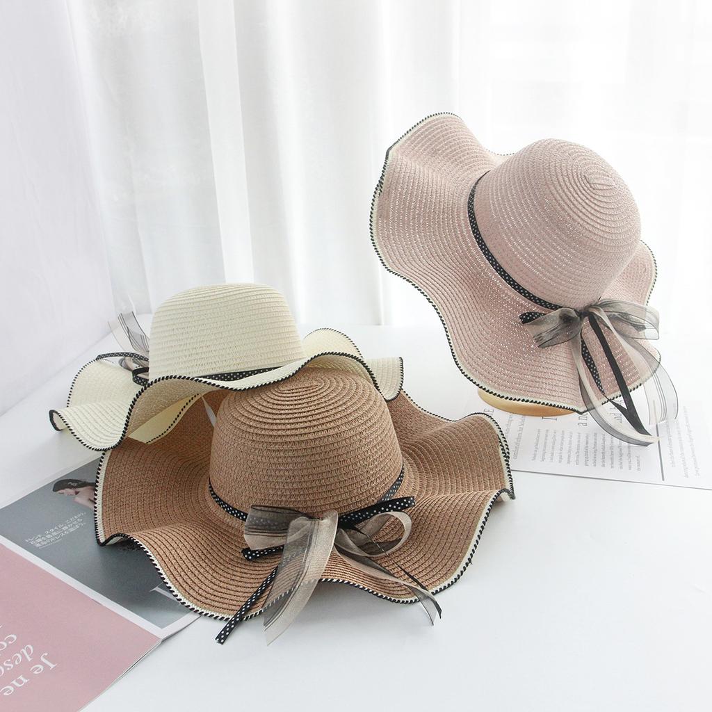 New straw hat summer wavy edge sun hat outdoor anti-fashion trend versatile seaside travel sun hat women's