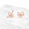 14K Rose Gold Butterfly Earrings with Gold Needles and Lovely Ring Piercings