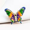 Элегантная эмалевая брошь в виде бабочки — модный аксессуар для костюма высокого класса