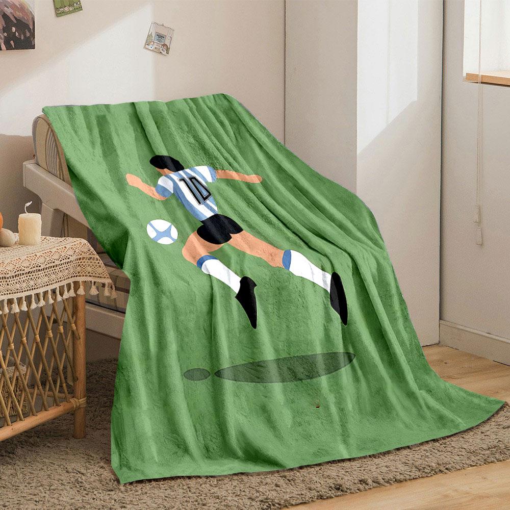 Illustration of a soccer player wearing stripes chasing a ball on a green field. for all seasons blanket lunch break throw gift