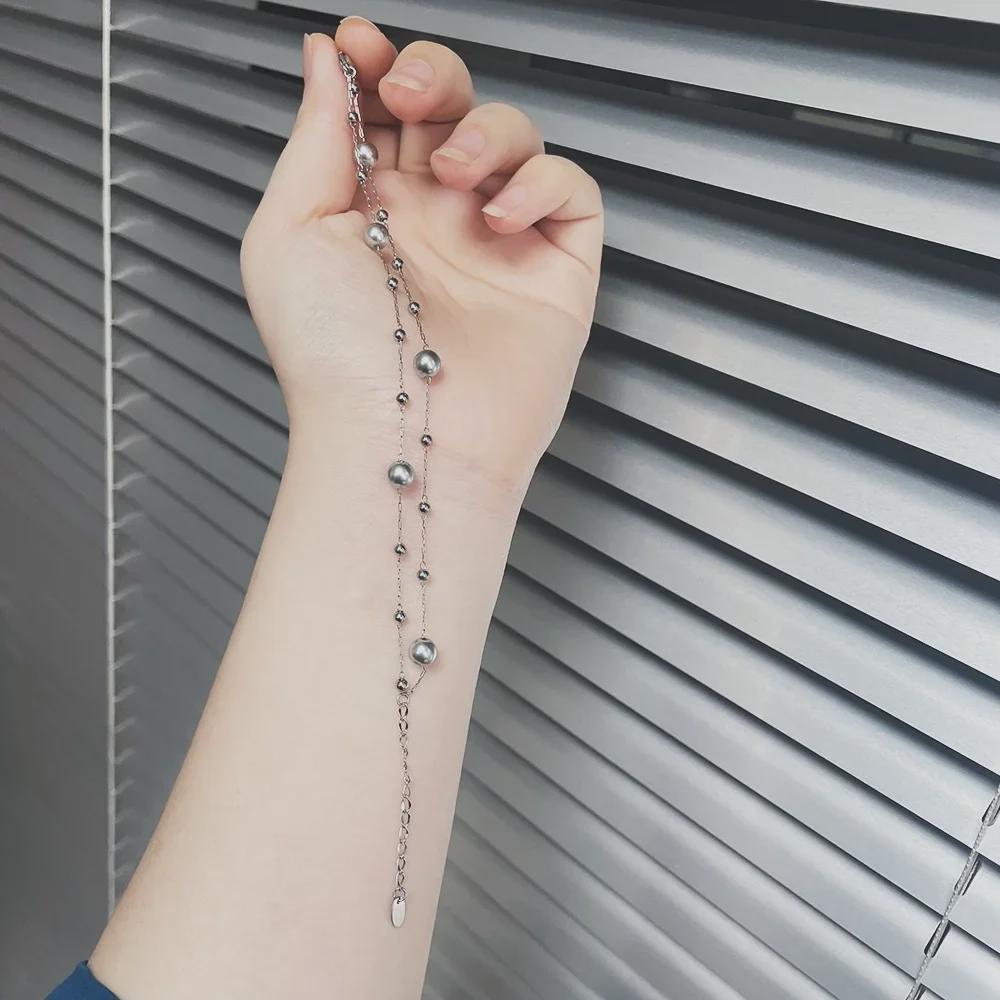 Браслет Interstellar Gray Whale Rain: Серебристо-серая жемчужная бусина ручной работы из титановой стали.