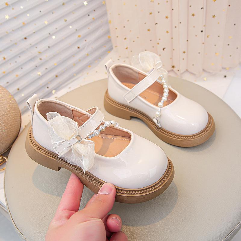 Spring new collection of children's shoes: fashionable bow-knot princess flats for girls, available in medium and large sizes, with pearl