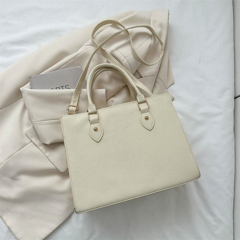 Стильная повседневная сумка-тоут для commuters на осень с современным простым дизайном и универсальными цветами