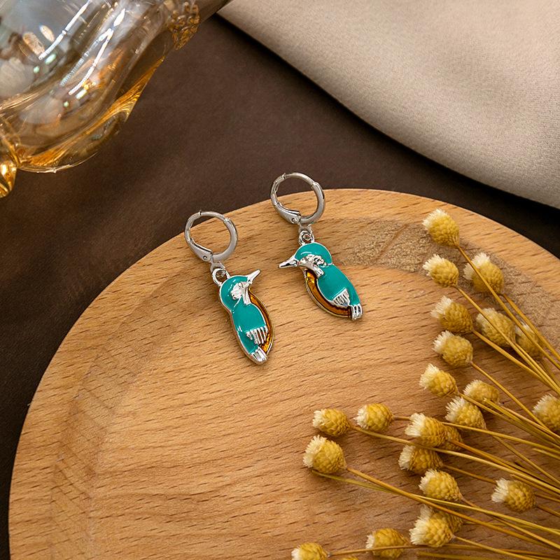 "European & American Retro Turquoise Feather Earrings: Bohemian Dragonfly, Bird, Water Drop, Round, & Pearl Designs"