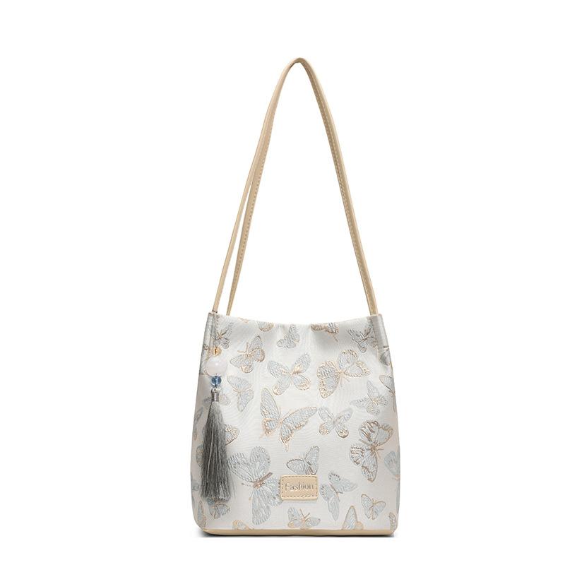 Новый китайский стиль, иностранный стиль, большая вместимость, сумка под мышкой, женская новая модная сумка-ведро для поездок на работу и обратно 2024 года