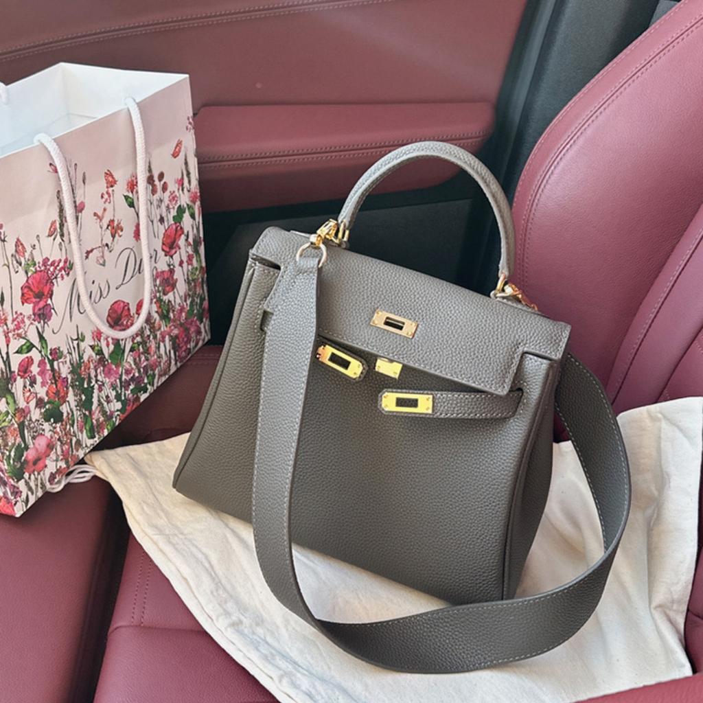 The New High-end Togo Top Layer Cowhide Wide Shoulder Strap Fashionable Single-shoulder Crossbody Hand-held Women's Bag Is Trendy