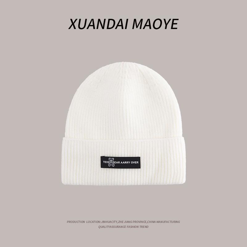 Осенние и зимние шапки женские плюшевые новые вязаные шапки универсальные теплые защитные наушники шерстяные утолщенные модные студенческие шапки